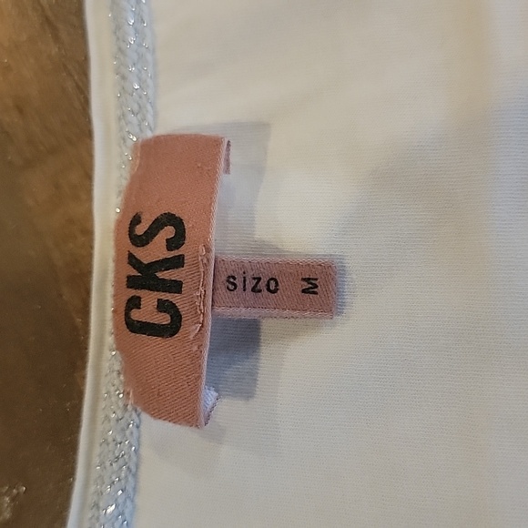 medium CKS WHITE TSHIRT with silver sequence raised words. - Picture 3 of 4